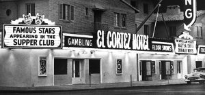 Nighttime exterior of El Cortez showcasing neon signs